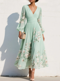 Cisella | Vestido midi verde claro con estampado floral
