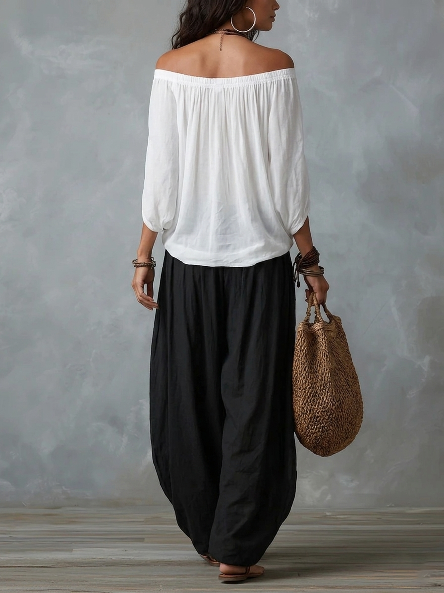 Conjunto de top blanco con hombros descubiertos y pantalones acampanados estilo farol